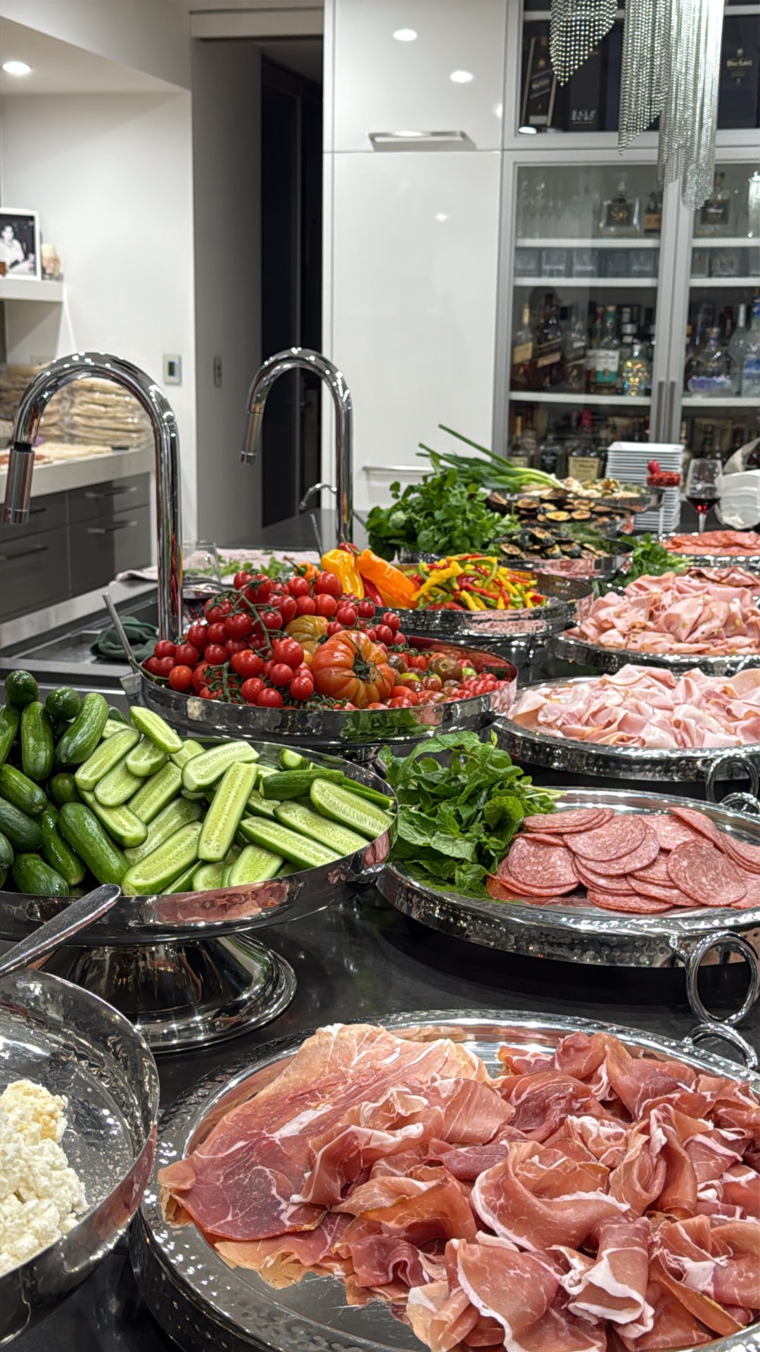 Salumi, cheeses and vegetables styled on platters